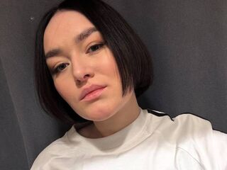 camgirl playing with dildo JannSandor
